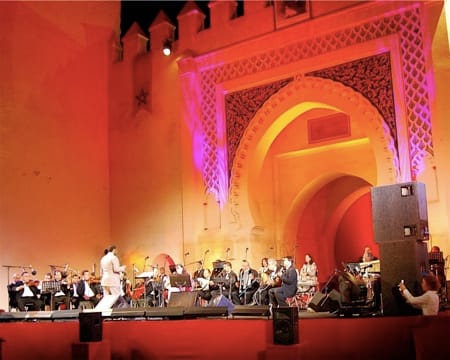 a group of people performing on stage